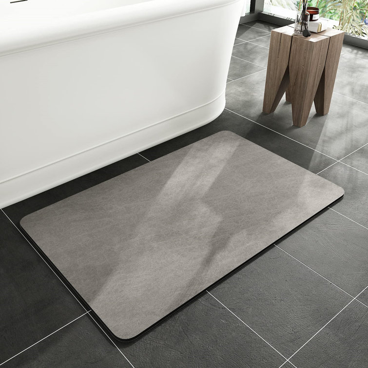 Rubber bath mat for outlet shower